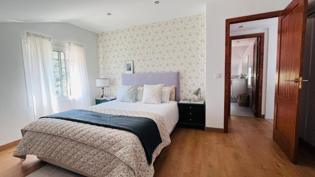 Postel nebo postele na pokoji v ubytování La Casita De La Loma