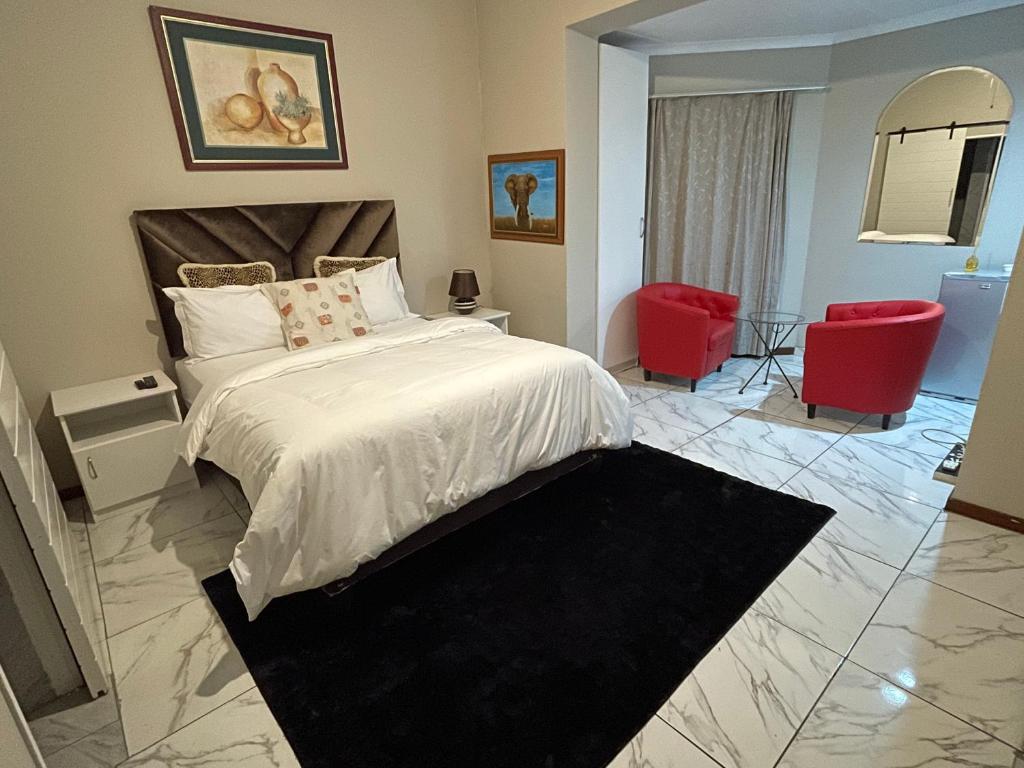 Ένα ή περισσότερα κρεβάτια σε δωμάτιο στο Platinum Oasis Retreat