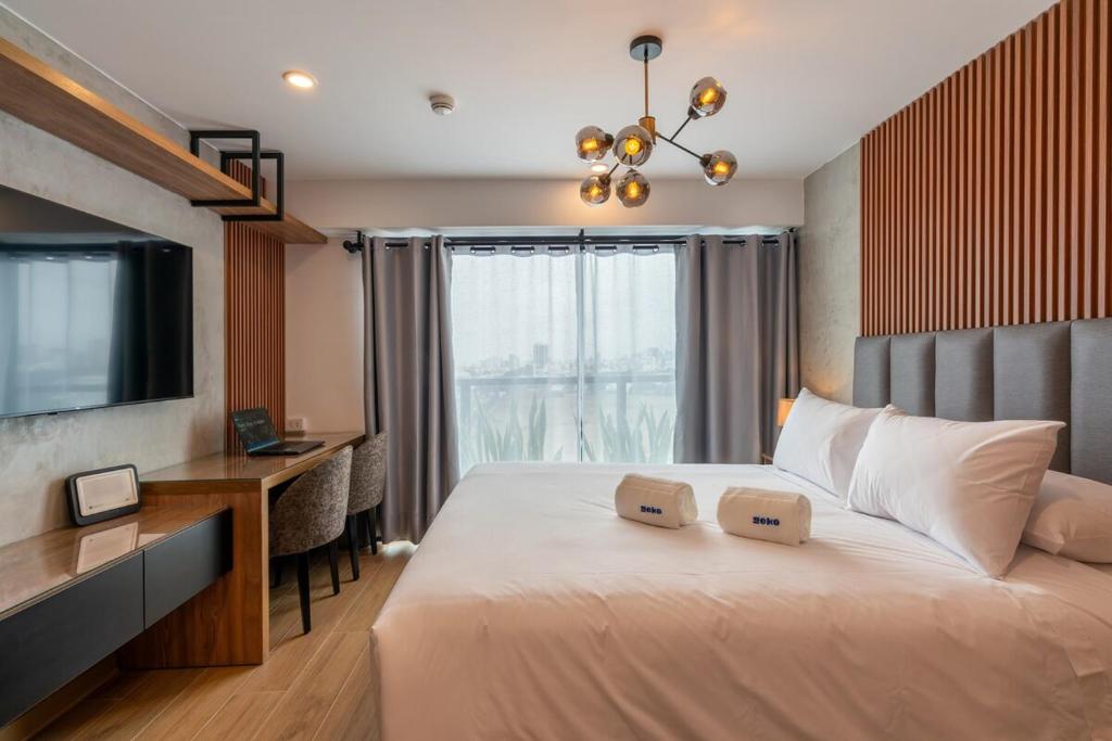 Ένα ή περισσότερα κρεβάτια σε δωμάτιο στο Orum Loft by Geko