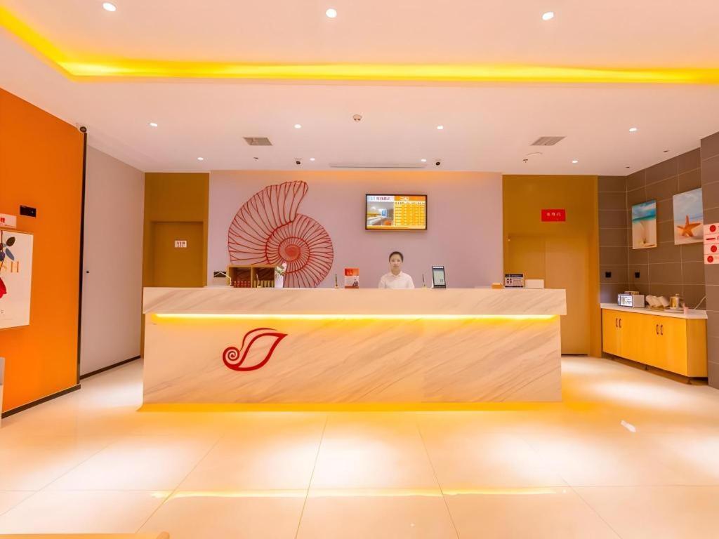 TV a/nebo společenská místnost v ubytování Shell Hotel Wuxi Gonghu Avenue Vientiane City