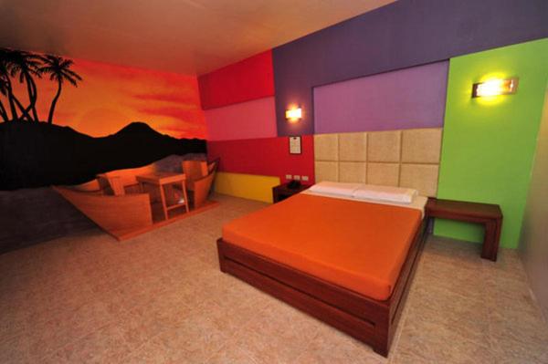 Postel nebo postele na pokoji v ubytování Hollywood Drive-In Hotel