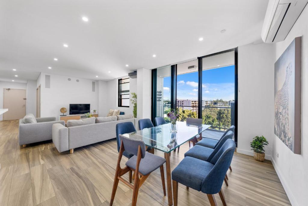 Μια τηλεόραση ή/και κέντρο ψυχαγωγίας στο Prime 3BR Apt with Parking & ICC & DarlingHarbour-10 mins walk
