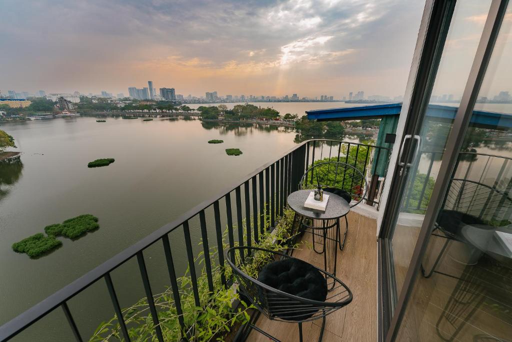 a view of a river from a balcony at An Nguyen Lakeside Residence in Hanoi