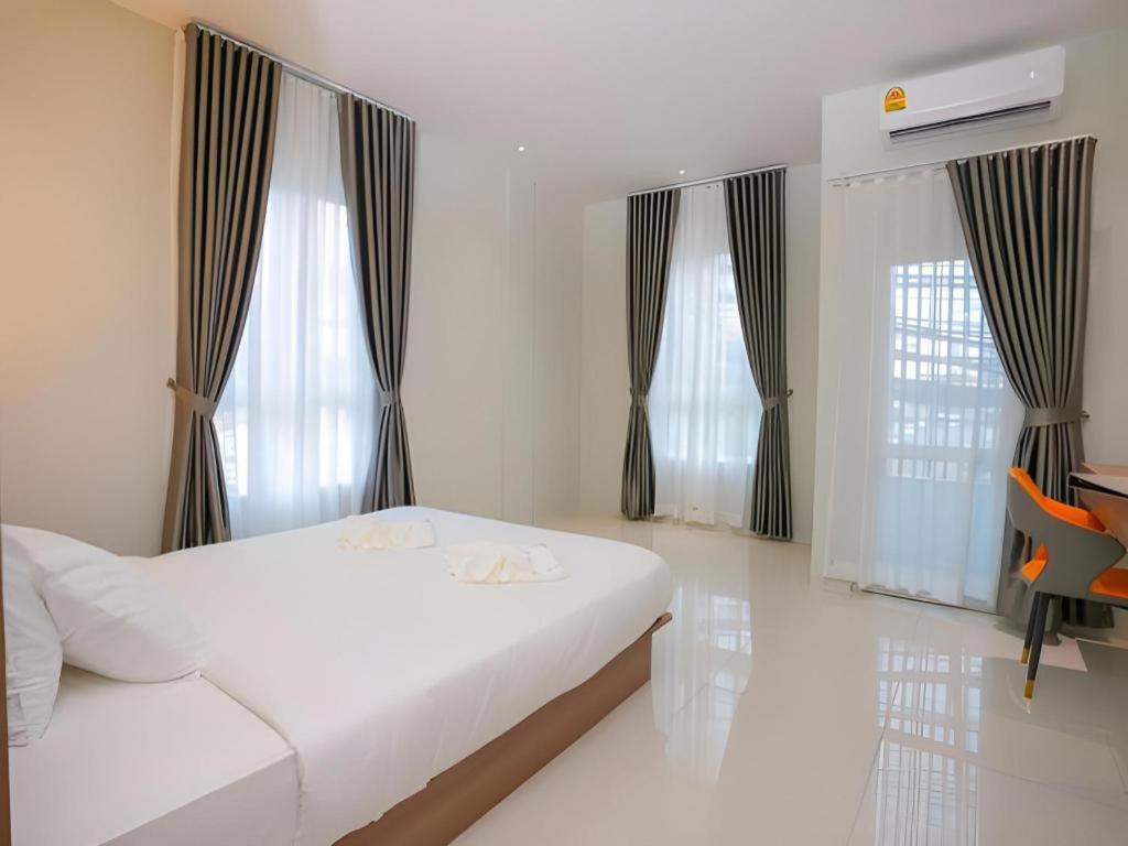 Ένα ή περισσότερα κρεβάτια σε δωμάτιο στο Athenee Hotel Vientiane