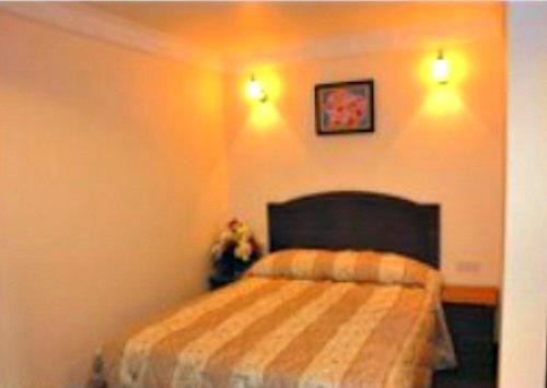 Postel nebo postele na pokoji v ubytování Hotel Remix