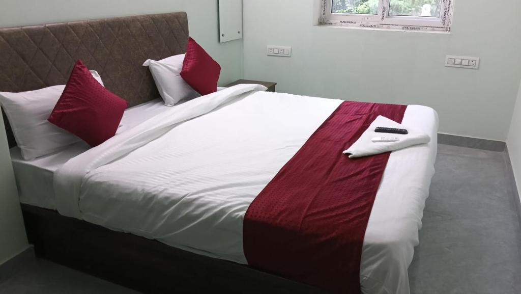 Ένα ή περισσότερα κρεβάτια σε δωμάτιο στο Hotel GIS Inn