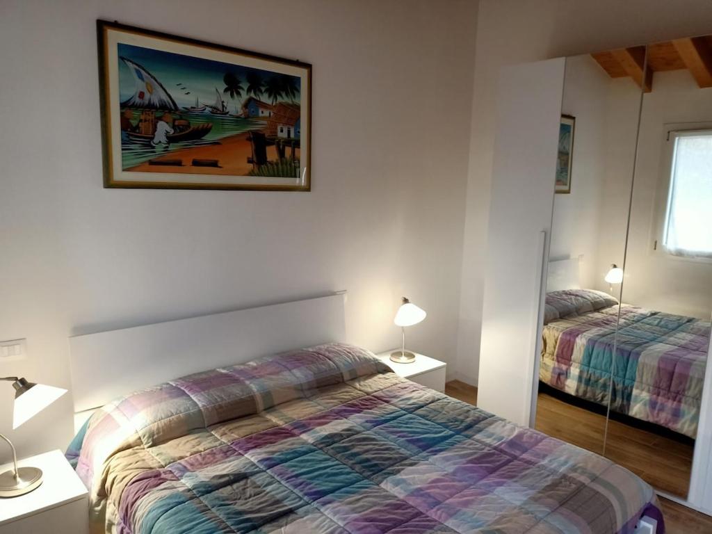 Ένα ή περισσότερα κρεβάτια σε δωμάτιο στο Residenza Stella