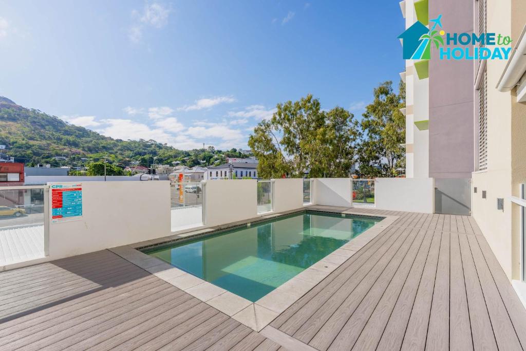 Πισίνα στο ή κοντά στο Home to Holiday at Kensington