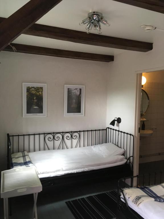 Una cama o camas en una habitación de Nova Harmonia