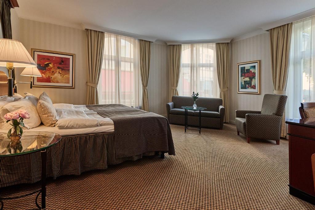 Postel nebo postele na pokoji v ubytování Elite Hotel Mollberg