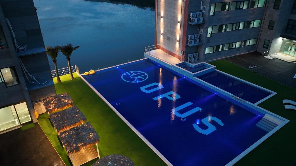 an overhead view of a swimming pool in a building at Hotel Opus in Gyeongju