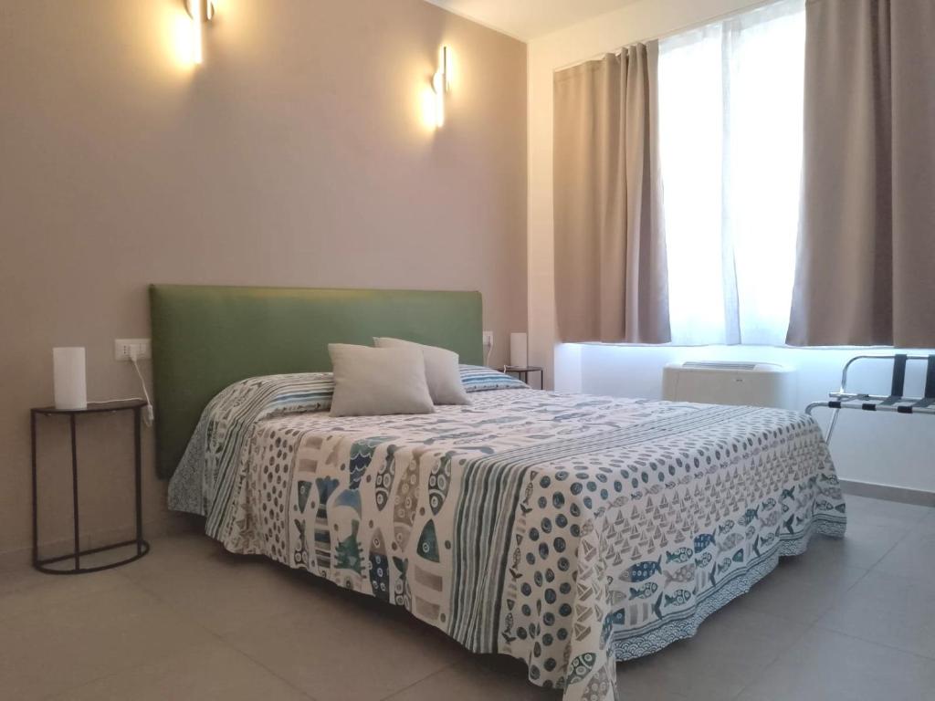 Postel nebo postele na pokoji v ubytování BnB Ranco