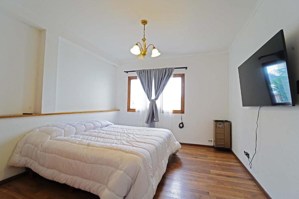 Et tv og/eller underholdning på Departamento amplio y equipado - Roca 2