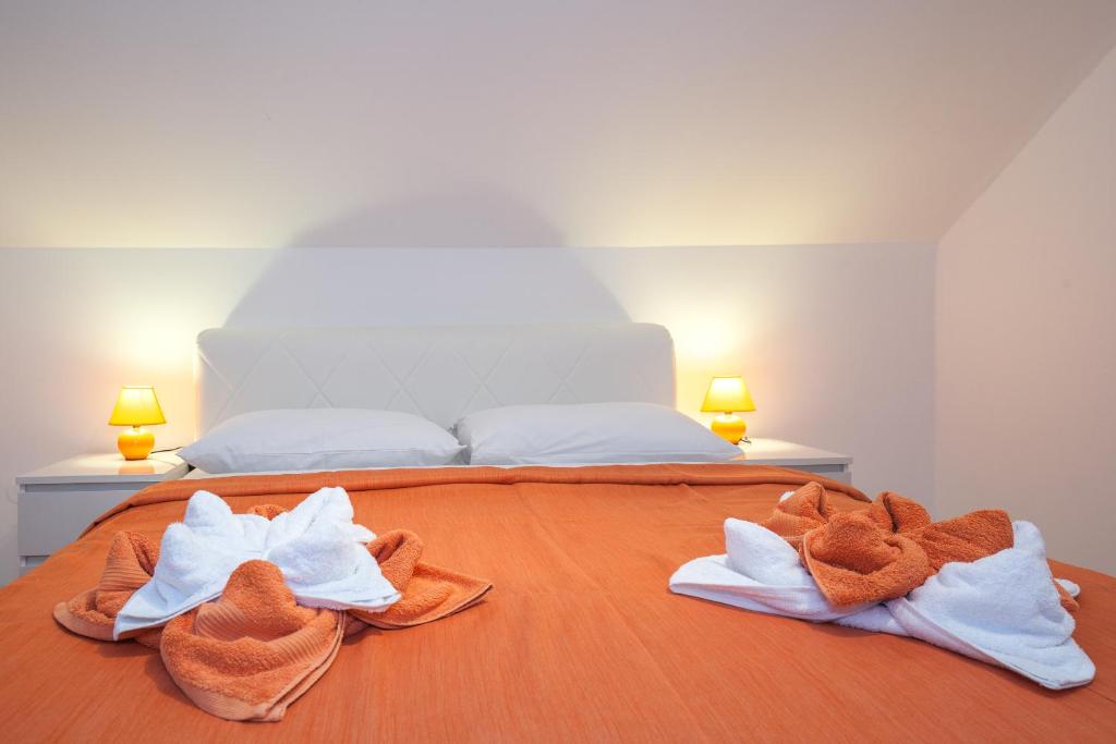 Posteľ alebo postele v izbe v ubytovaní Guest House Slavica