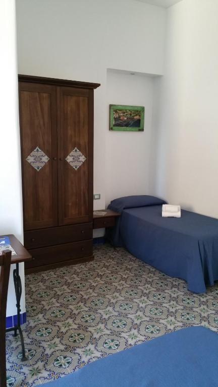 Postel nebo postele na pokoji v ubytování Hotel A Cannata