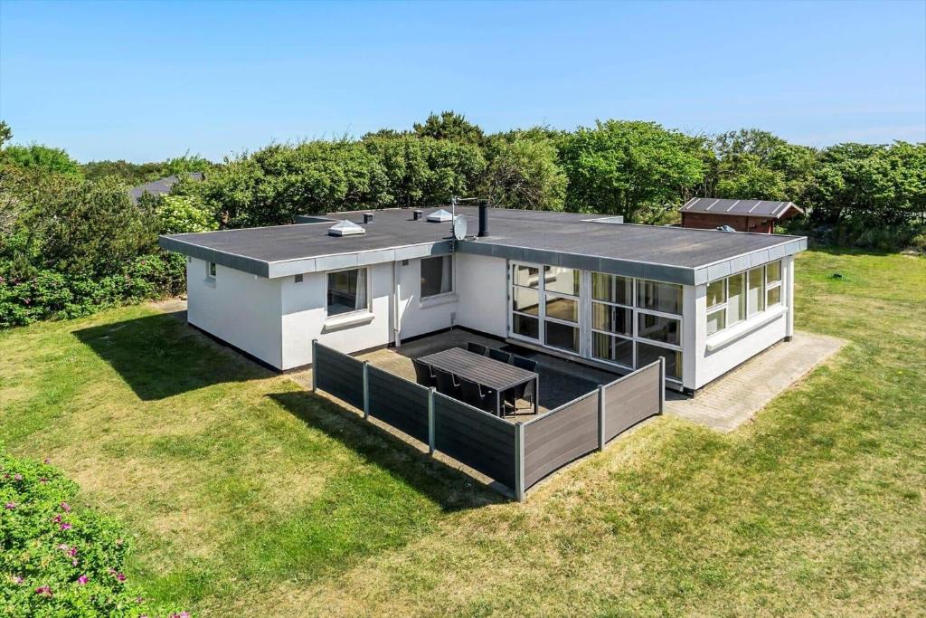 an overhead view of a house in a field at 355-Hvide-Sande-Fyrmarken-54 in Hvide Sande