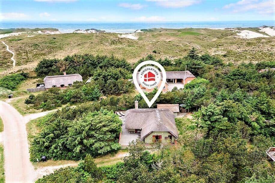 an aerial view of a house with a large wheel at 602-Hvide-Sande-Nygardsvej-32 in Bjerregård