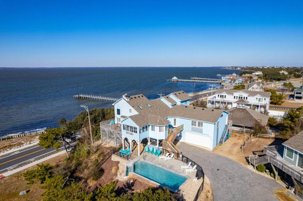 an aerial view of a house and the ocean at Duck Blind by Rather Be Properties in Duck
