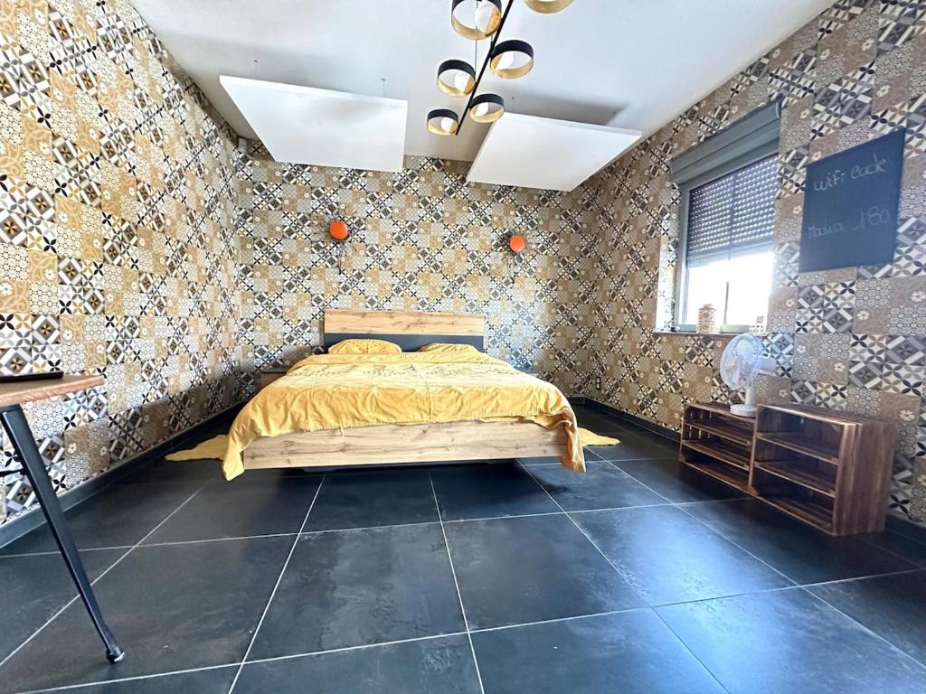 Postel nebo postele na pokoji v ubytování appartement chez radia 1