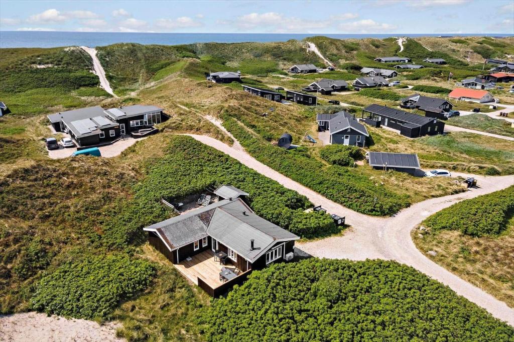 an aerial view of a house on a hill at 498-Hvide-Sande-Karen-Brands-Vej-105 in Hvide Sande