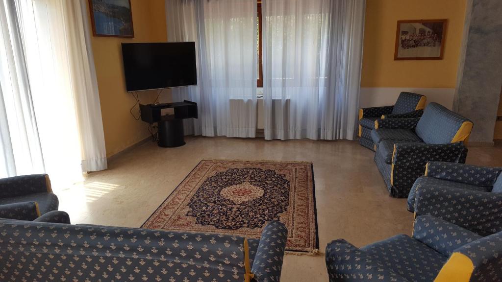 TV a/nebo společenská místnost v ubytování Hotel Ulisse