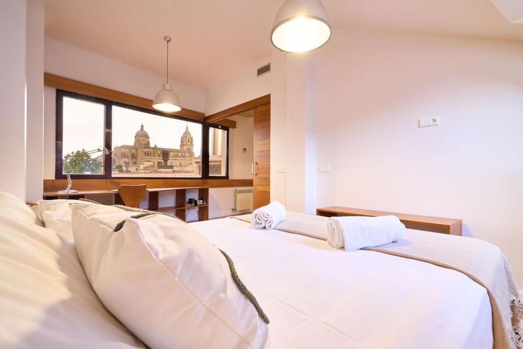 Ein Bett oder Betten in einem Zimmer der Unterkunft La terraza de la Catedral Collection Luxury