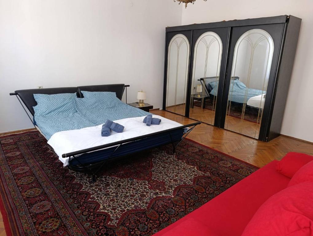 Ένα ή περισσότερα κρεβάτια σε δωμάτιο στο MD Home