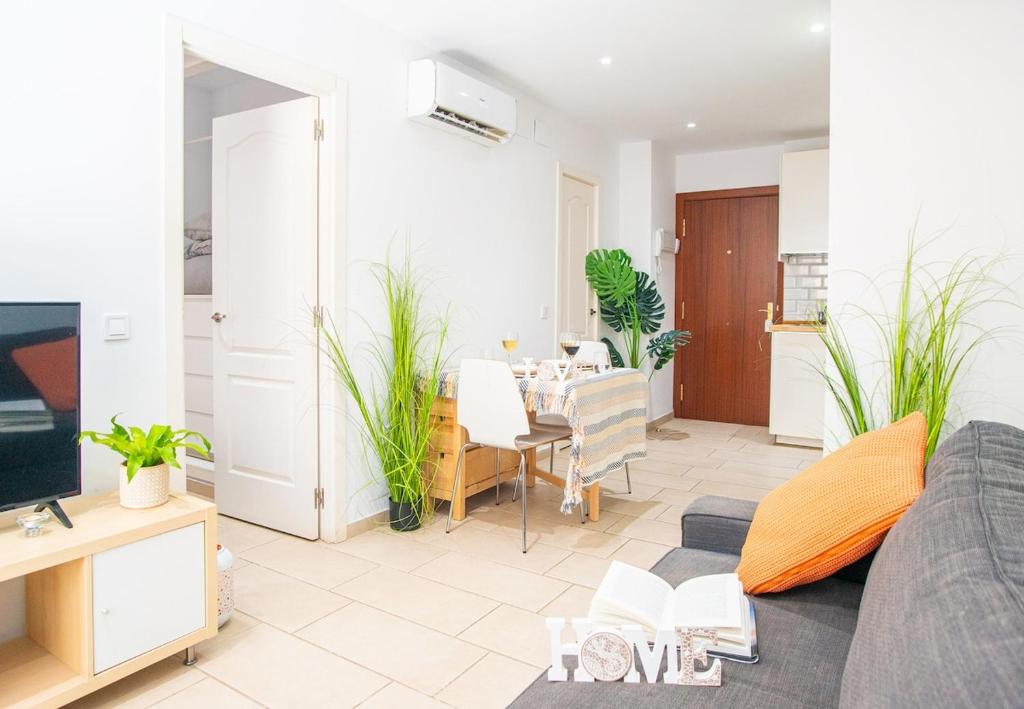 a living room with a couch and a table at Luxury Executive Stay - Fuengirola Center in Fuengirola