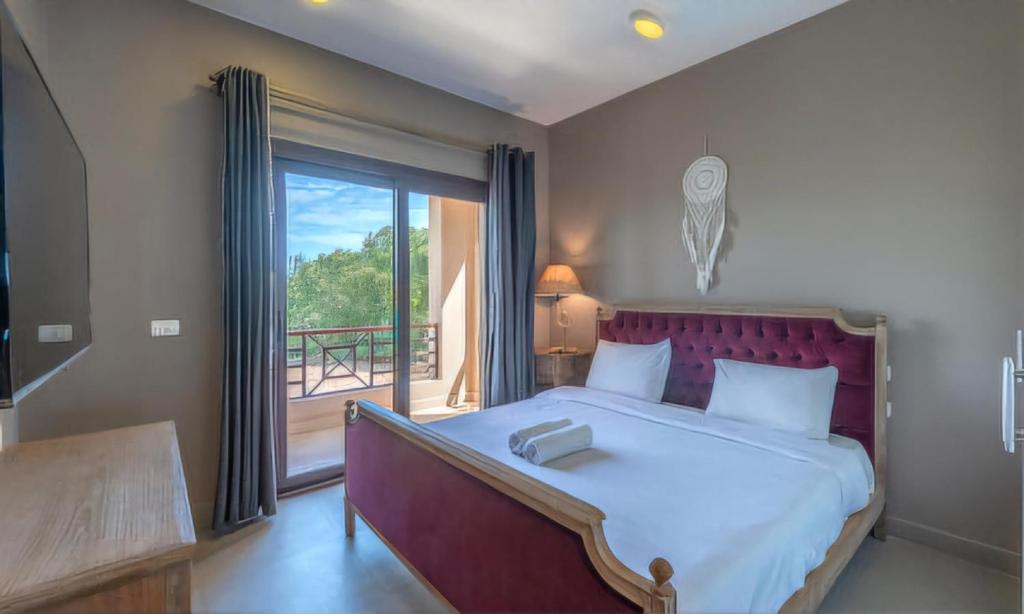 Giường trong phòng chung tại Luxury Stays in Sabina El Gouna