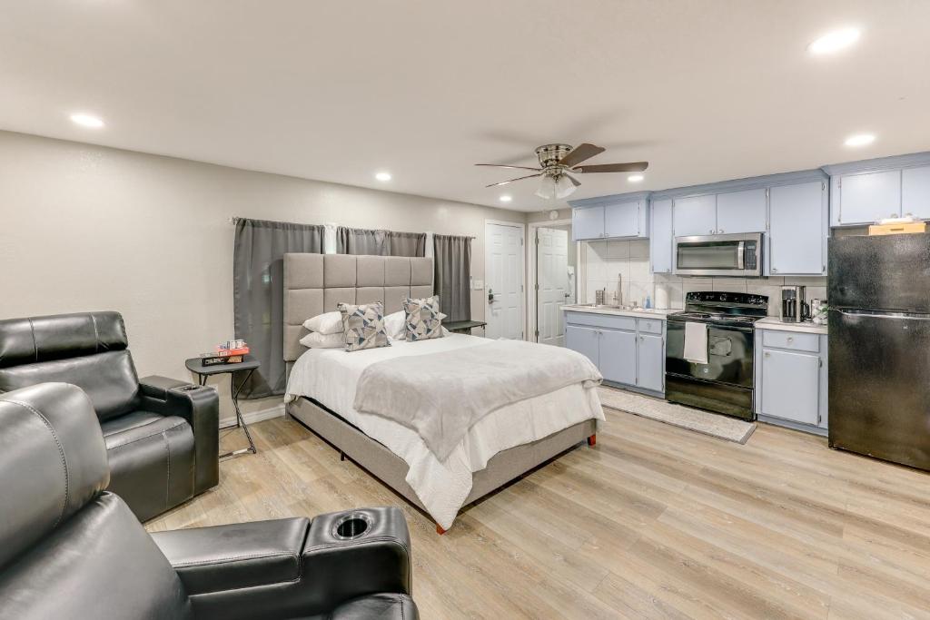 a large bedroom with a bed and a kitchen at Private Yard: Pet-Friendly Studio in New Boston! in New Boston