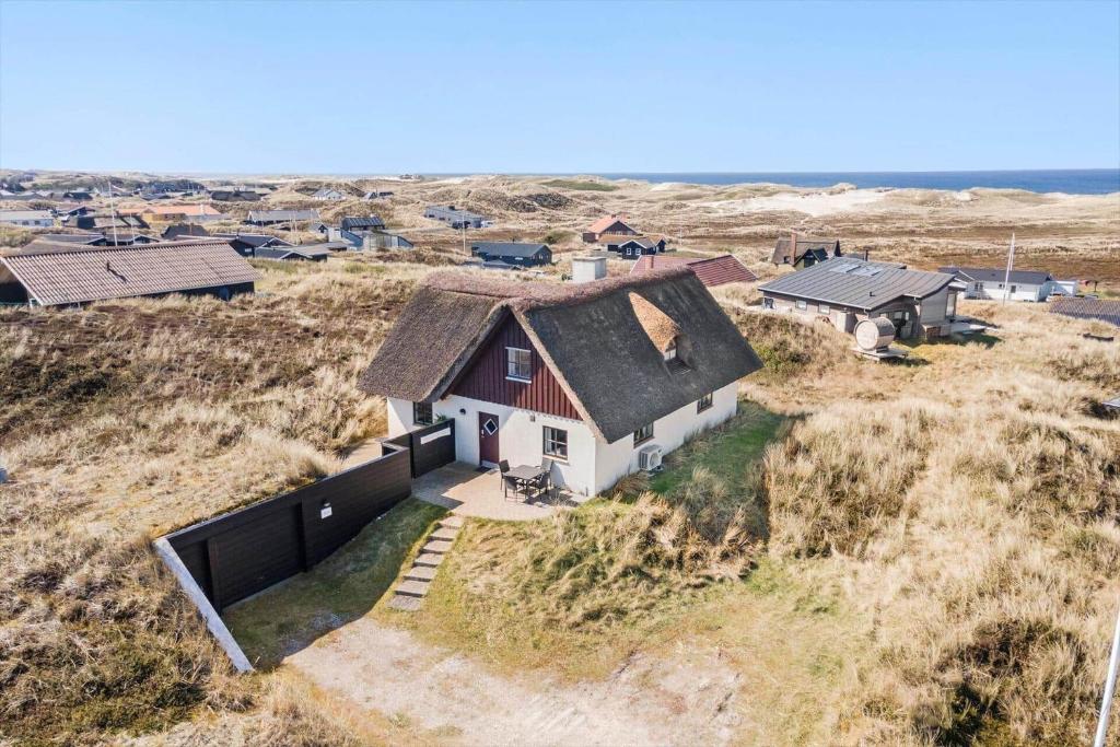 an aerial view of a house in a field at 179-Ringkobing-Nordsovej-236 in Søndervig
