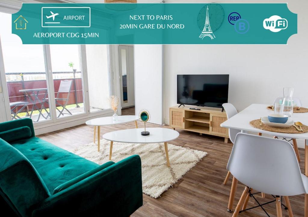 a living room with a couch and a tv at L Échappée Bellini - Proche Paris - 15min Airport in Aulnay-sous-Bois