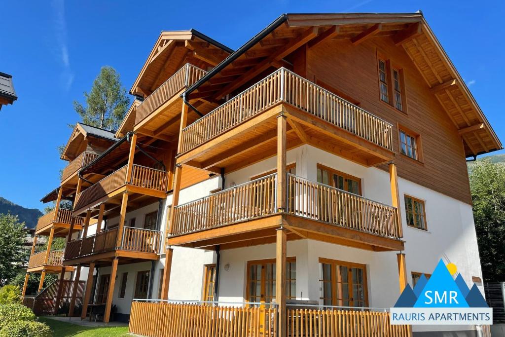a large apartment building with balconies on it at Kerstin 3 by SMR Rauris Apartments - inc Spa and near Gondola in Rauris