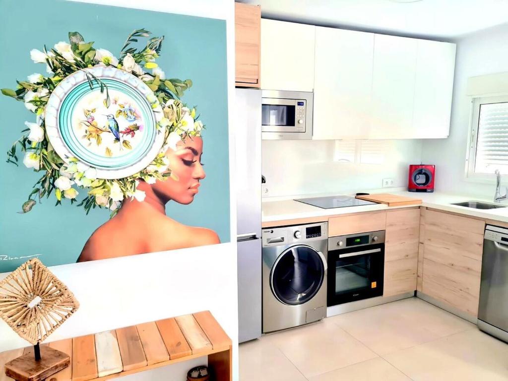 A kitchen or kitchenette at Apartamento Moderno y con Estilo en La Carihuela