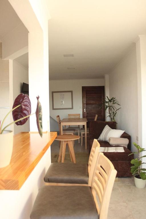 a living room with a couch and a table at Departamentos M&A 1 in Puerto Rico