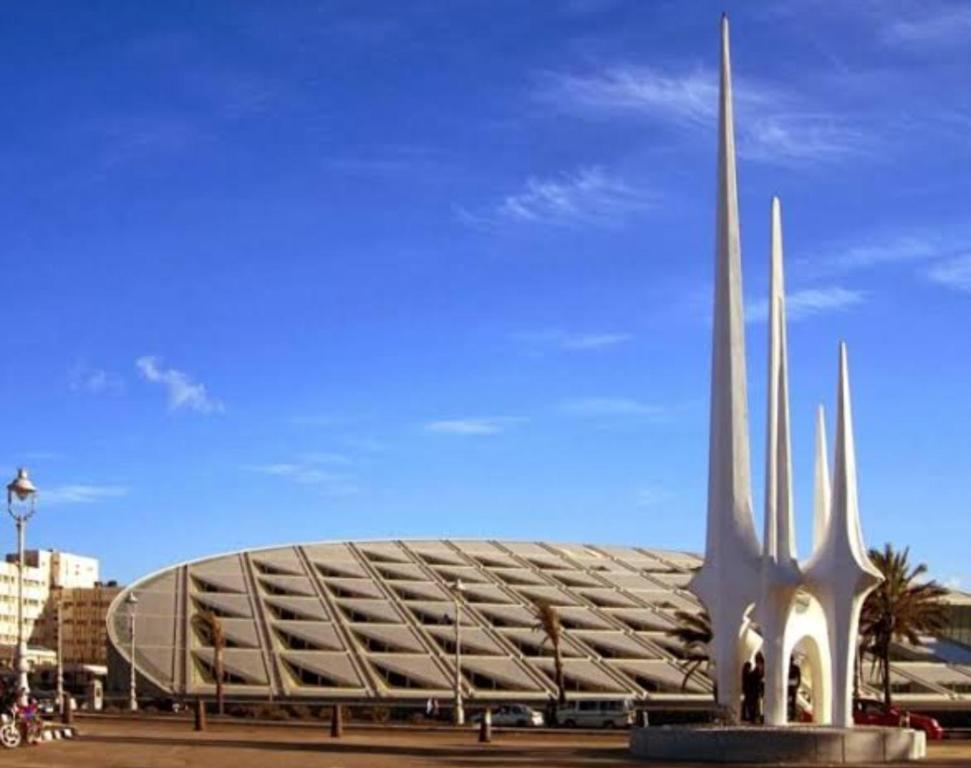 ein großes Stadion mit einem großen Gebäude davor in der Unterkunft SUN SEA HOLIDAy 13 ALMOAYYED STREET in Alexandria