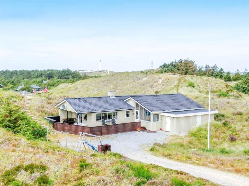 a house on top of a hill at 319-Hvide-Sande-Gammeleng-16 in Hvide Sande
