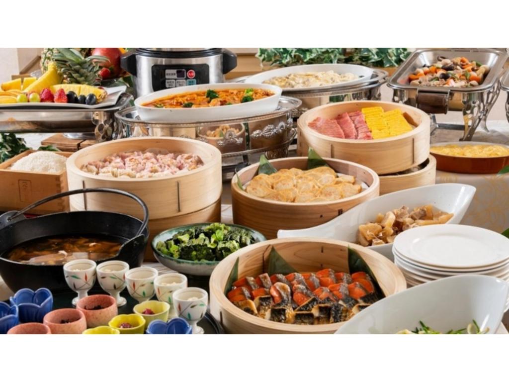 a buffet with many different types of food in buckets at Hotel Symphony - Vacation STAY 85393v in Sagae
