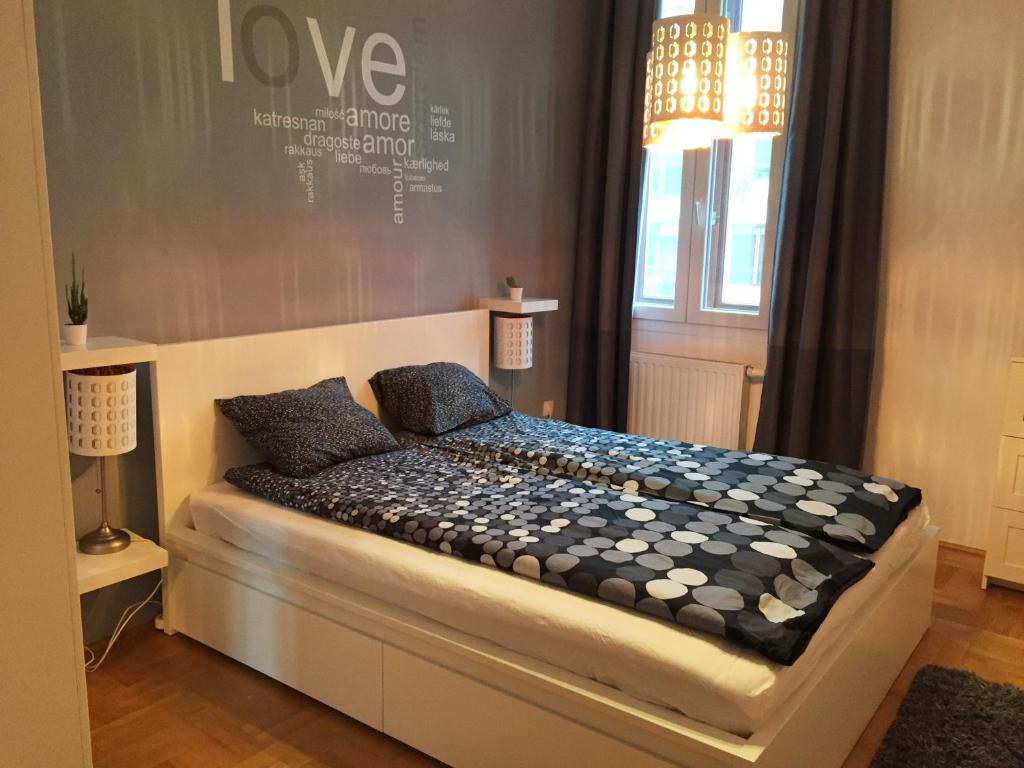 Posteľ alebo postele v izbe v ubytovaní Gozsdu Apartment
