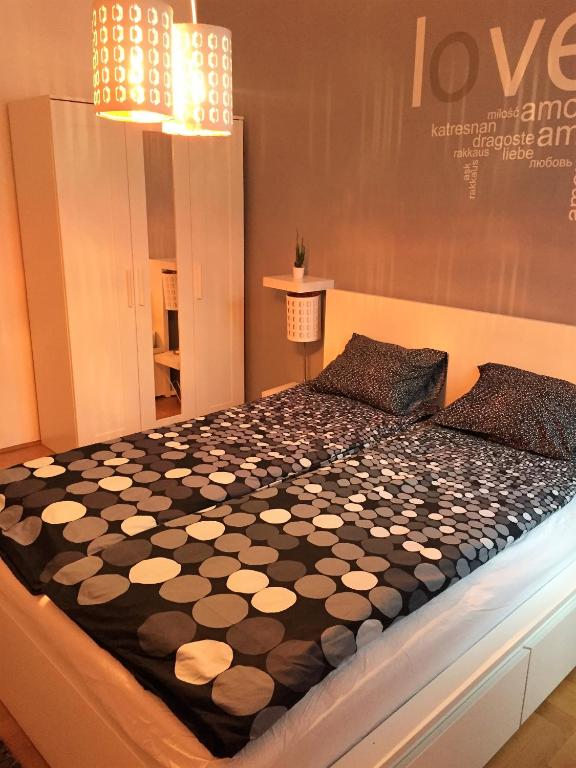 Posteľ alebo postele v izbe v ubytovaní Gozsdu Apartment