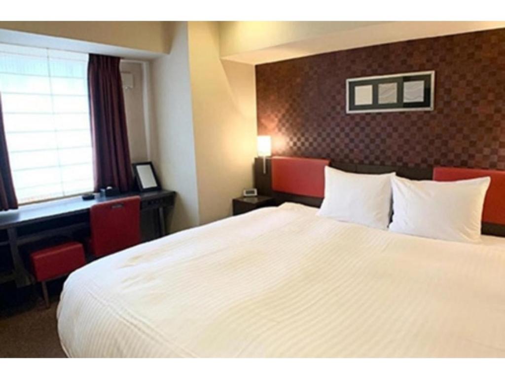 Katil atau katil-katil dalam bilik di Smile Hotel Nagoya Sakae - Vacation STAY 66736v