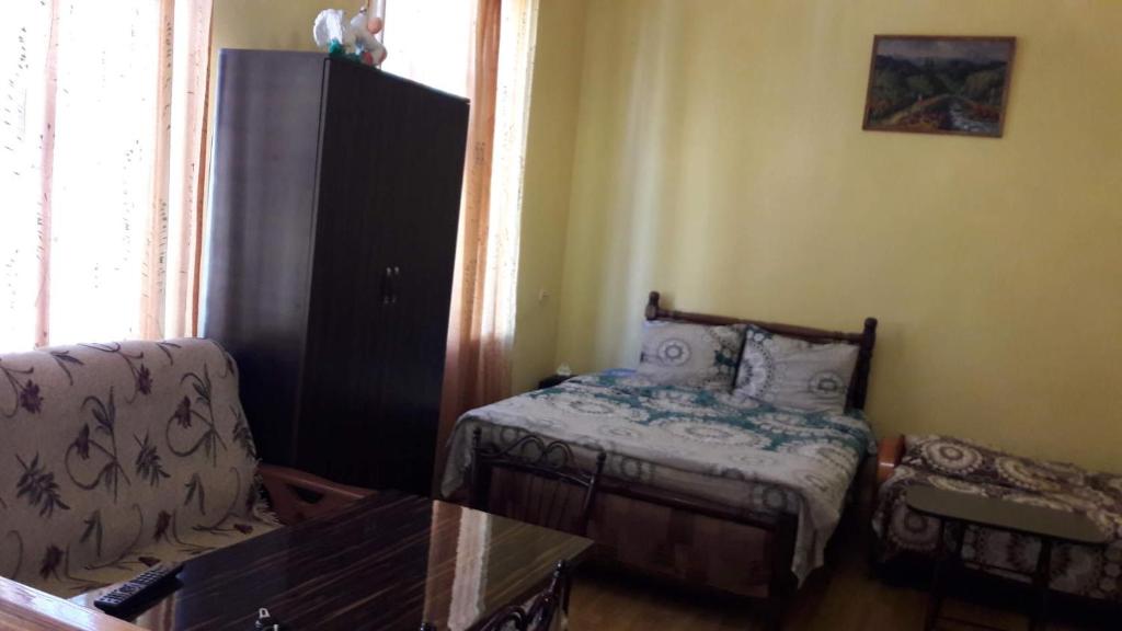 Llit o llits en una habitació de Apartment Malakhit