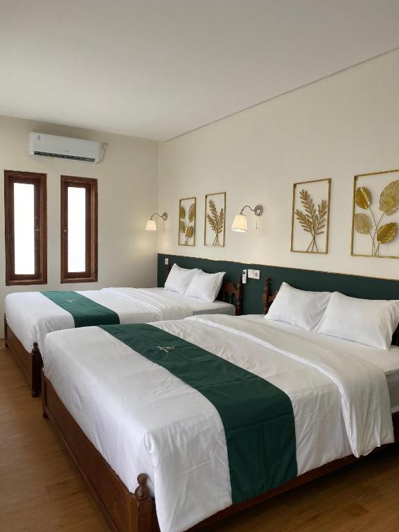 Agung Guest House by RF - Chambre Queen De Luxe Avec 2 Lits Queen-Size