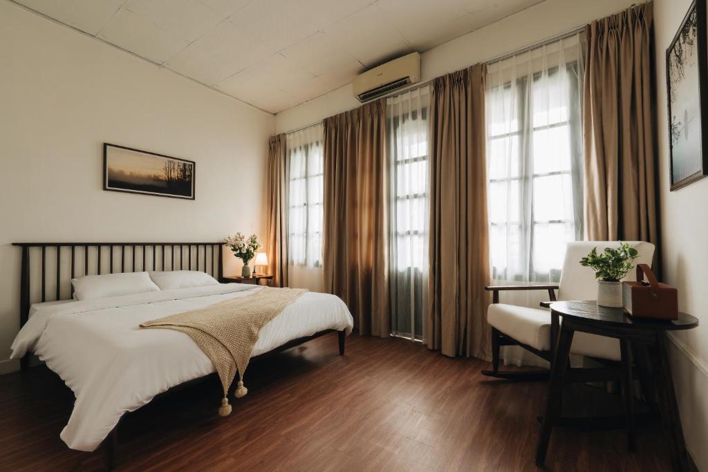 Postel nebo postele na pokoji v ubytování Dusk House