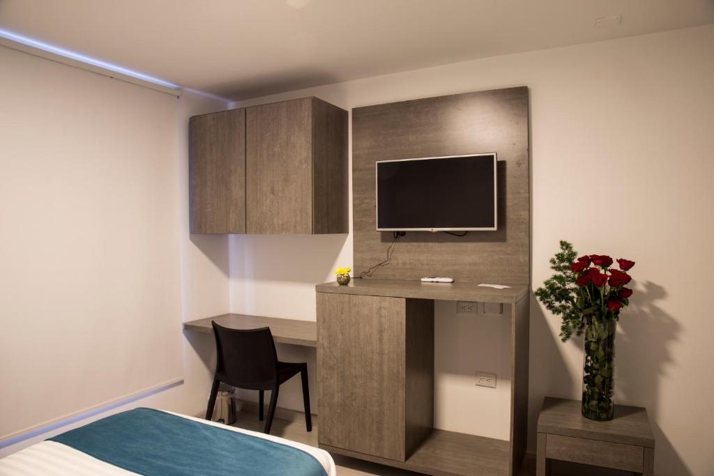 Postel nebo postele na pokoji v ubytování Agora Suites Self-Service Boutique Hotel