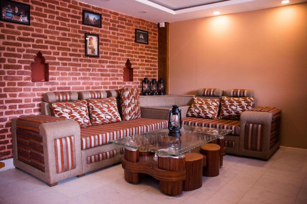 Posezení v ubytování Nag Pukhu Guest House