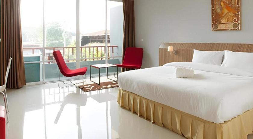 Postel nebo postele na pokoji v ubytování Soontree House Hotel