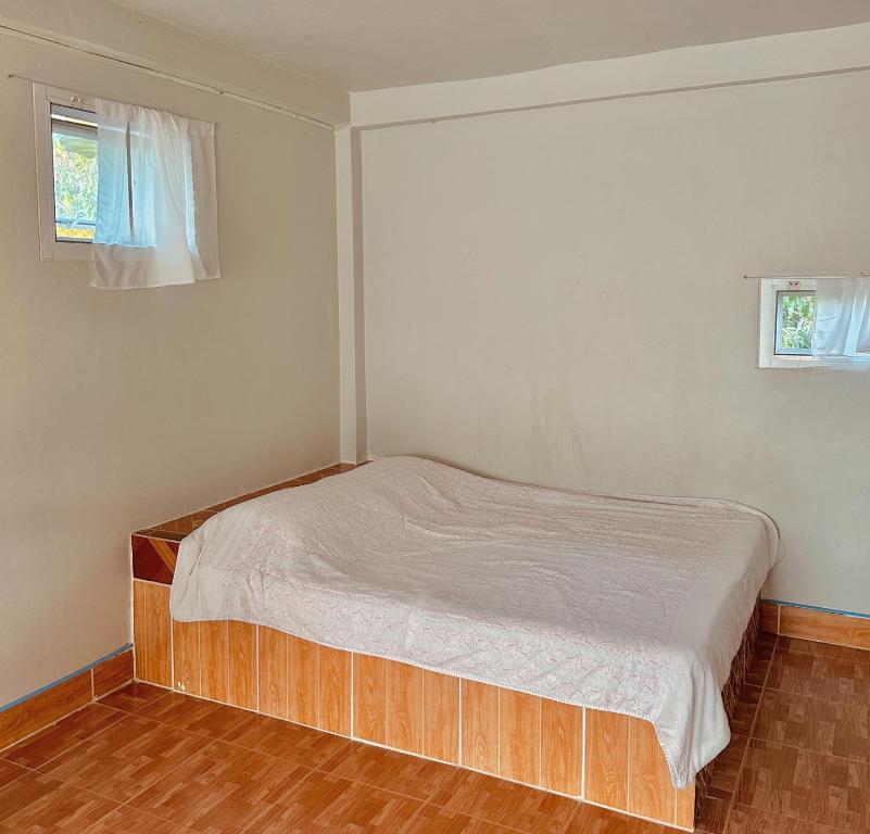 Voodi või voodid majutusasutuse PoiJai home บ้านปล่อยใจ toas