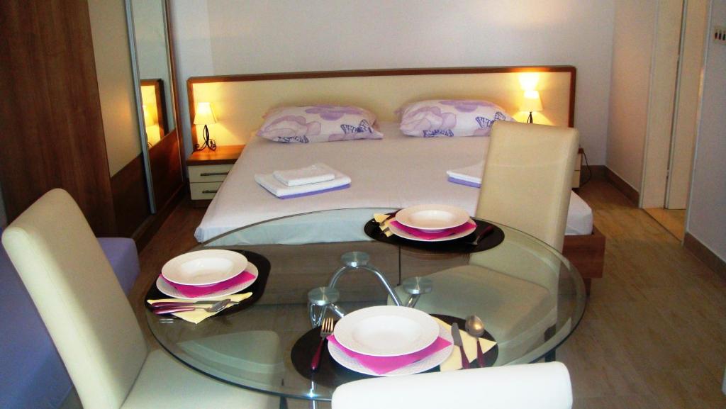 Postel nebo postele na pokoji v ubytování Apartments Topo