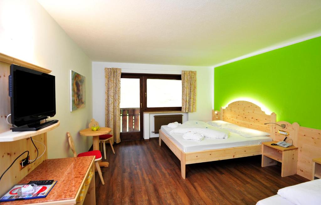 TV a/nebo společenská místnost v ubytování Hotel Gerstgras